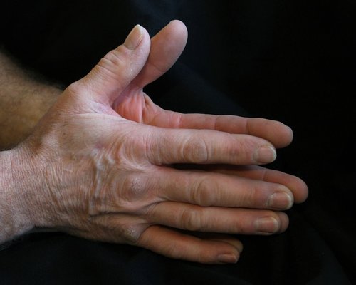 clenched hands showing tension